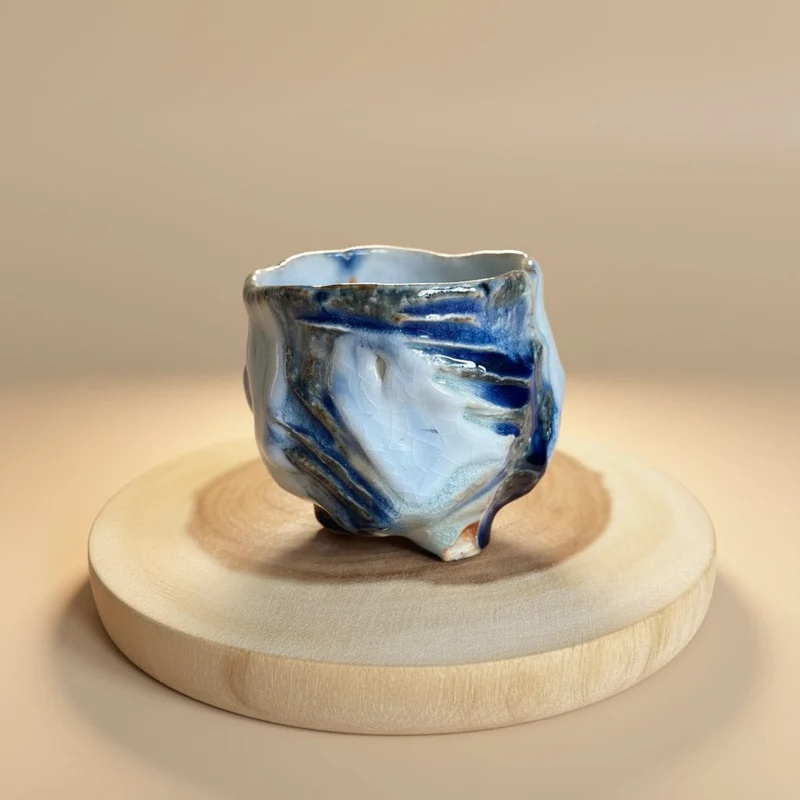Jingdezhen Holzgebrannte blau-weiße fließend glasierte Teetassen-Kollektion